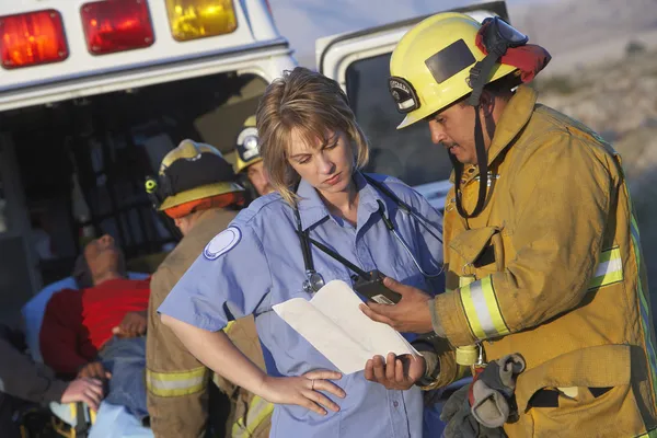 depositphotos 33801257 stock photo fire fighters and paramedics